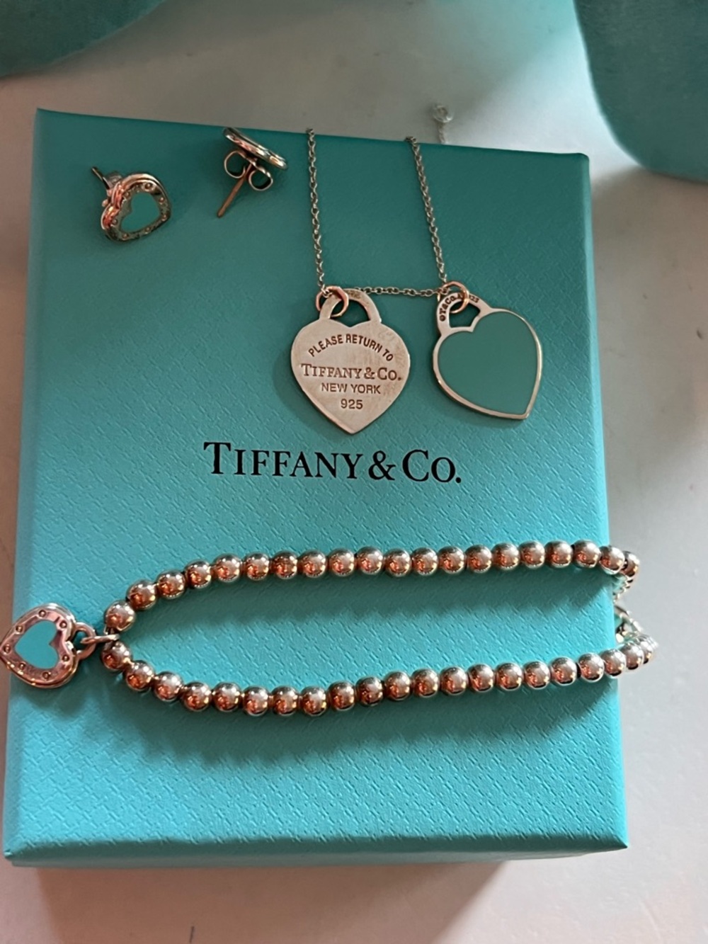 Brand-new Tiffany & Co. jewelry set, never worn, includes all original boxes.